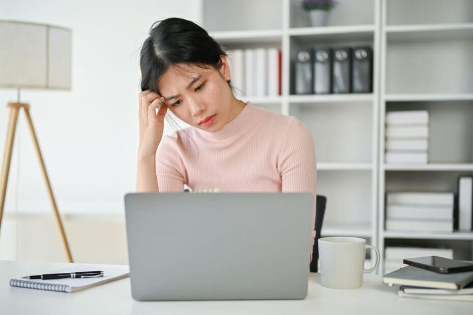 Woman reading about the updates to the Overtime Overhaul concerning Texas' ruling about FLSA